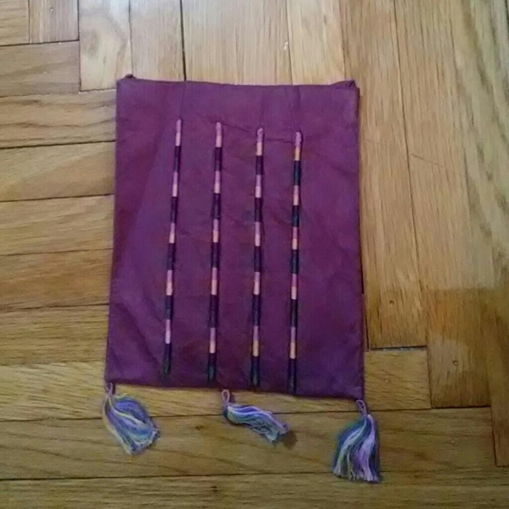 Handmade pouch with embroidery details